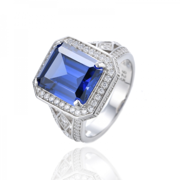 Emerald Cut Tanzanite And Round White Cubic Zirconia Rhodium Silver Ring 